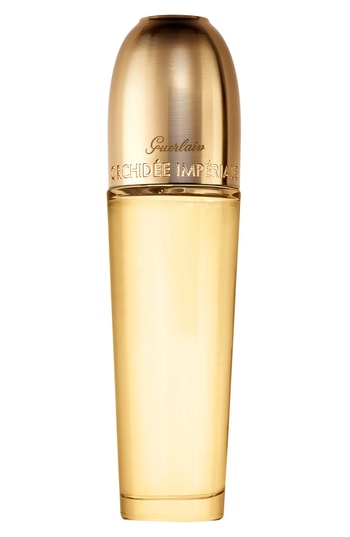 Gold-tone bottle with a sleek, curved design, featuring a rounded cap and embossed "Guerlain Orchidee Imperiale" text, containing 1oz of luxurious oil.