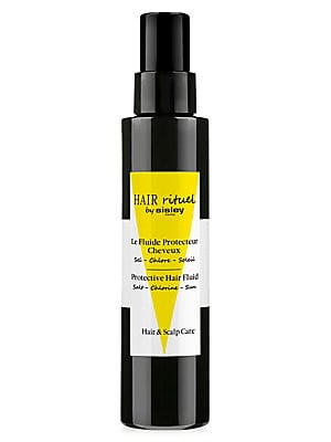 Black spray bottle with a sleek design, featuring a yellow label that reads "HAIR rituel by Sisley" and "Protective Hair Fluid," 150ml capacity.