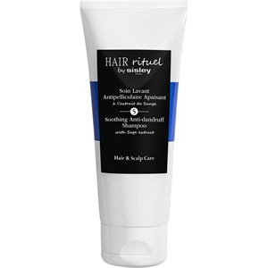 White tube of Sisley Hair Rituel Soothing Anti-Dandruff Shampoo with a black label and blue stripe, featuring text highlighting its anti-dandruff and soothing properties.