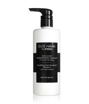 White bottle with a black pump dispenser, featuring a black label that reads "Hair Rituel by Sisley Soothing Anti-dandruff Shampoo" and details about hair and scalp care.