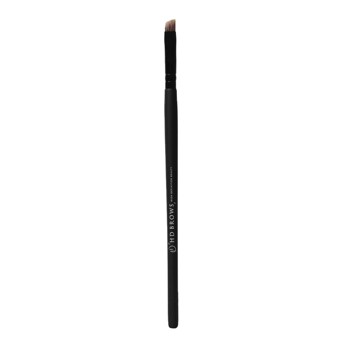 Super fine angled brow brush with a sleek black handle and a clear brush head, designed for precise brow application and shaping.