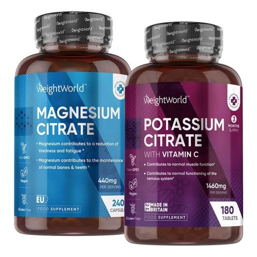 Two brown bottles of supplements labeled "Magnesium Citrate" and "Potassium Citrate with Vitamin C," featuring blue and purple accents, each with 240 and 180 tablets respectively.