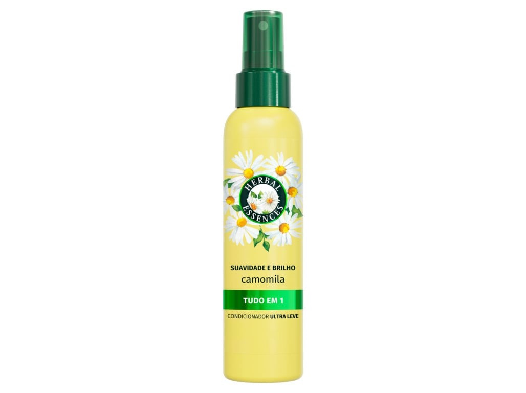 Yellow spray bottle with a green cap, featuring a floral design and the text "Herbal Essences" and "Camomila" prominently displayed, indicating a chamomile conditioner.