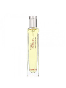 Clear glass bottle with a silver cap, containing light yellow Eau De Parfum, labeled "Terre D Hermes Eau De Intense Vetiver" in red and gold, accompanied by a sleek pouch.