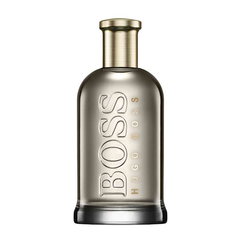 Clear glass bottle with a sleek, rounded shape, featuring a gold cap and embossed "BOSS HUGO BOSS" logo in bold letters, containing 6.7 oz of men's eau de parfum.