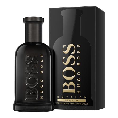 Black glass bottle with a sleek design, featuring gold lettering that reads "BOSS HUGO BOSS" and "BOTTLED PARFUM," accompanied by a matching black box.