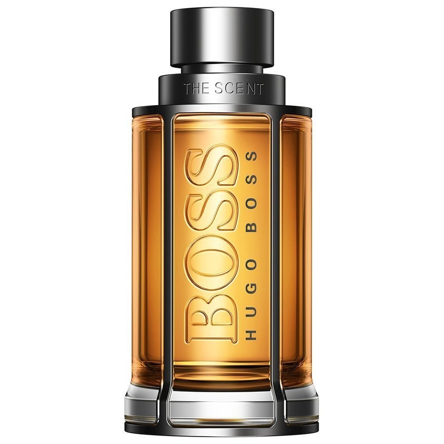 Clear glass bottle with a rectangular shape, featuring a silver cap and embossed "BOSS HUGO BOSS" text, filled with amber-colored aftershave lotion.