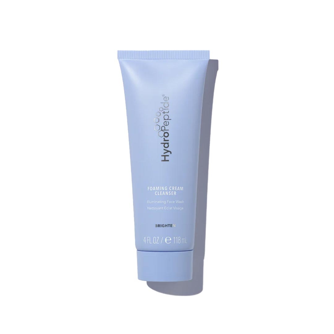 Light purple tube of HydroPeptide Foaming Cream Cleanser, 118ml, featuring a sleek design and clear labeling, with "Brighten" prominently displayed on the front.