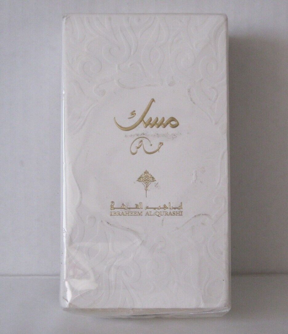 Sealed white box with elegant gold lettering, featuring the name "Ibraheem Al Qurashi" and ornate designs, indicating a unisex EDP fragrance with an expiration date of 2027.