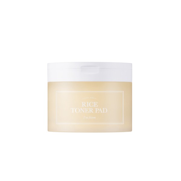 Round, translucent container with a white lid, holding 60 rice toner pads; the label features a light beige background with elegant white text stating "Rice Toner Pad."