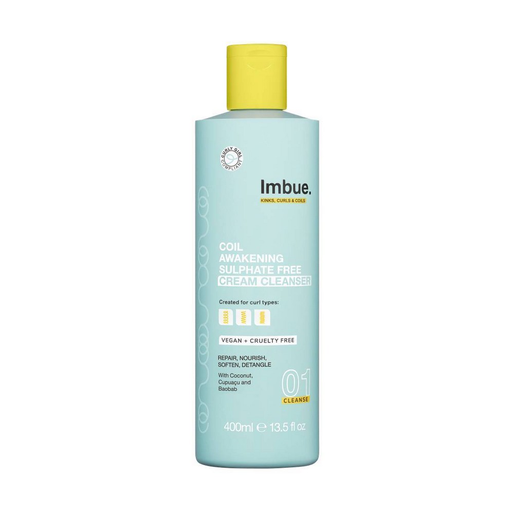 Light blue bottle with a yellow cap, labeled "Imbue Coil Awakening Sulphate Free Cream Cleanser," 13.5 fl oz, featuring a swirl design and vegan, cruelty-free certification.