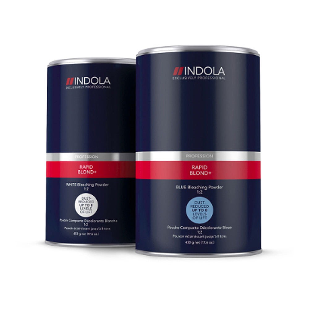 Two cylindrical containers of Indola Rapid Blonde Bleach, one labeled "White" and the other "Blue," both featuring a dark blue design with red accents and professional branding.