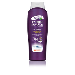 Purple plastic bottle of Instituto Español Soft Shower Gel, 1250ml, featuring a white cap, moon and star graphics, and text highlighting its gentle, moisturizing properties.
