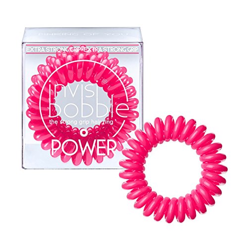 Three pink Invisibobble Power hair bands in a clear box, featuring a spiral design for extra grip and hold, ideal for securing hair without damage.