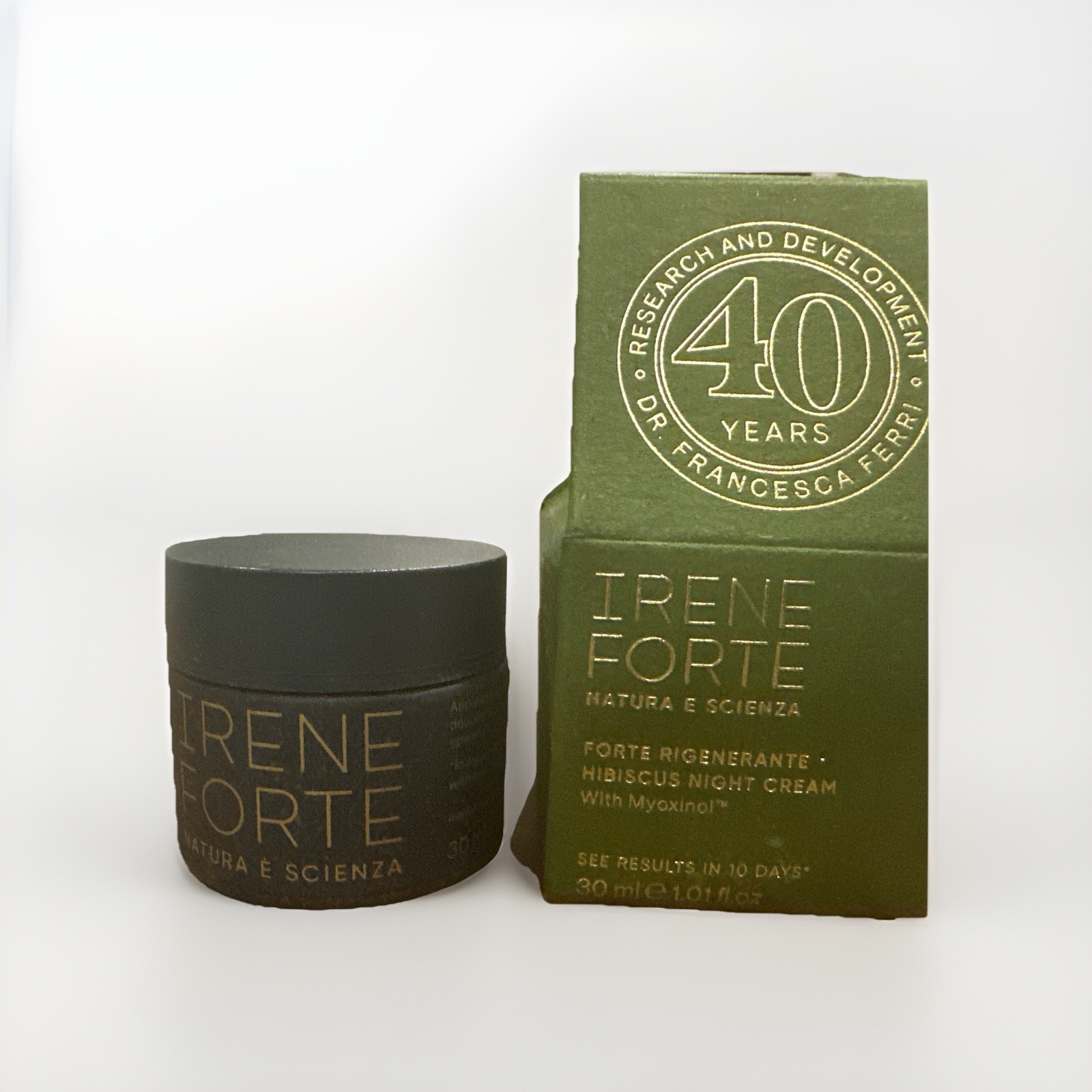 Hibiscus Night Cream in a dark green jar with a black lid, accompanied by a green box featuring gold text celebrating 40 years of Irene Forte Skincare, 30ml size.