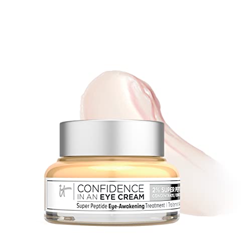 Jumbo jar of It Cosmetics Confidence in an Eye Cream, featuring a smooth, light beige cream with a glossy finish and a white label detailing its key ingredients and benefits.