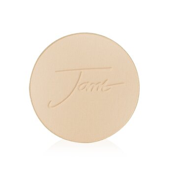Round, pressed mineral foundation refill in a light amber shade, featuring the embossed "Jane" logo on a smooth surface, packaged in a compact design.