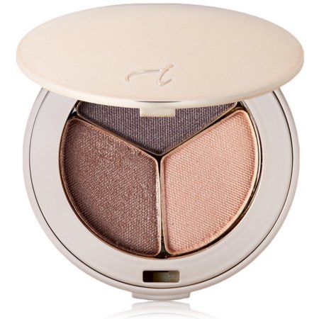 Compact featuring three eye shadow shades: a shimmery light pink, a matte taupe, and a deep shimmery brown, all housed in a sleek, round, cream-colored case.