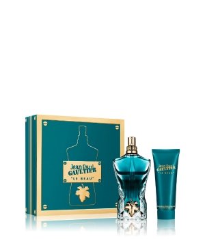Turquoise gift set featuring a 75ml EDT in a sculpted glass bottle resembling a torso, alongside a 75ml shower gel, all presented in a matching box with gold accents.