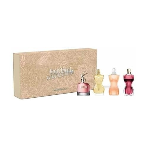 Gift set featuring four miniature perfume bottles in distinct shapes and colors: pink, gold, peach, and burgundy, presented in an elegant, patterned beige box.