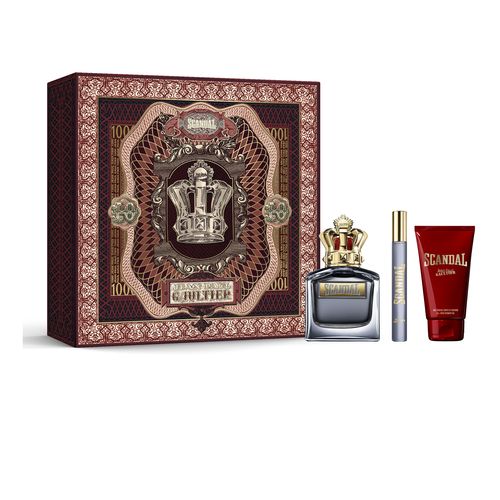 Jean Paul Gaultier Scandal for Him set includes a 100ml Eau De Toilette, a travel spray, and a shower gel, all presented in a decorative red and gold box featuring a crown design.
