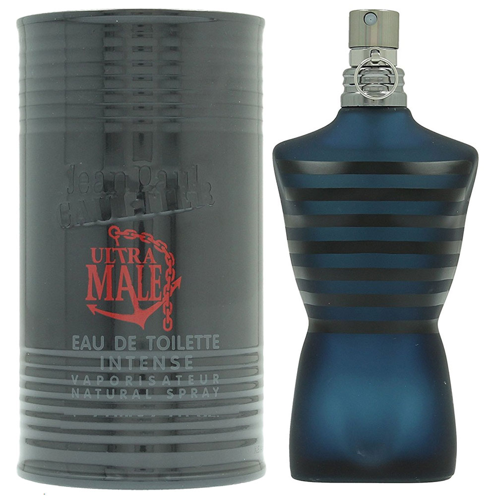 Dark blue bottle shaped like a torso with black stripes, featuring a silver cap, alongside a matching cylindrical gray box labeled "Jean Paul Gaultier Ultra Male Intense EDT M 125 Ml."