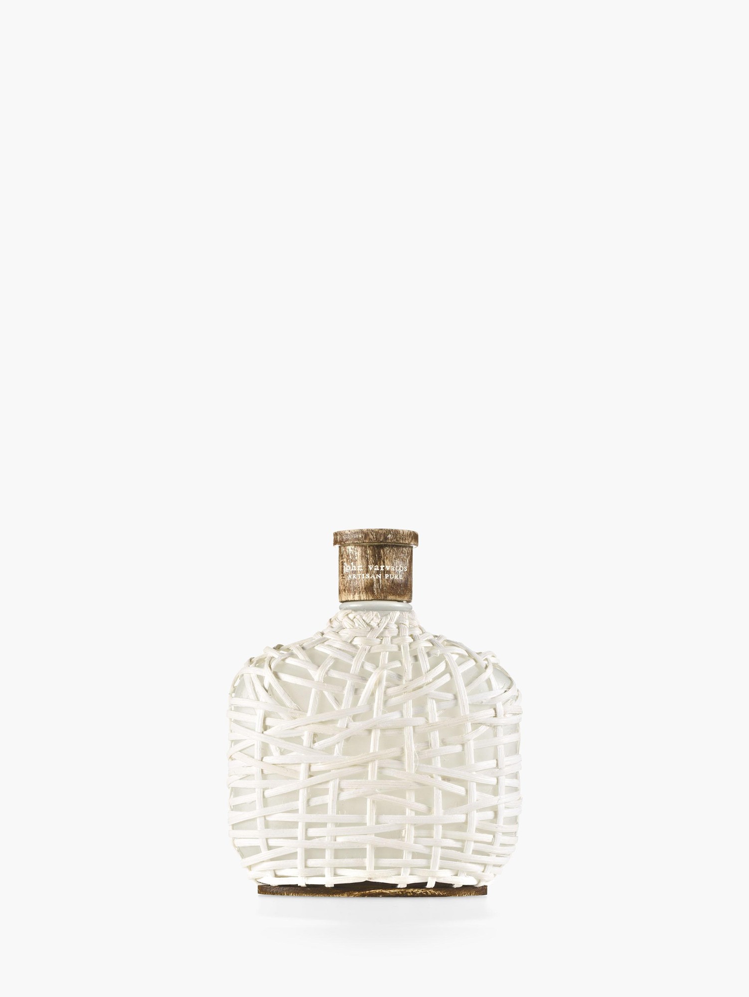 Clear glass bottle wrapped in a white woven design, topped with a textured gold cap, containing John Varvatos Artisan Pure EDT, 75 ml.