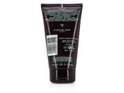 Dark purple tube of Joop! Homme shower gel, 5 oz, featuring a sleek design with white and turquoise text, and a flip-top cap for easy dispensing.