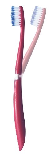Two soft toothbrushes: one with a red handle and blue bristles, and the other with a pink handle and blue bristles, featuring a click mechanism for easy storage.