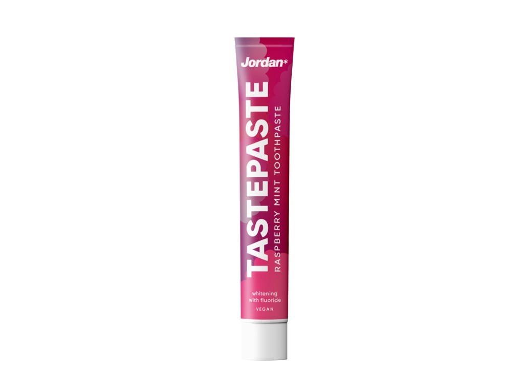 Jordan Tastepaste Raspberry Mint Toothpaste in a 50 ml tube features a vibrant pink design with white text, highlighting its vegan formula and whitening properties.