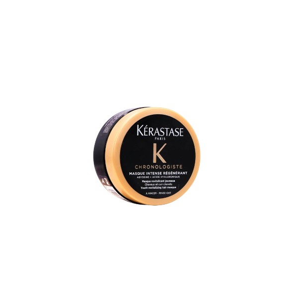 Black and gold round jar of Kérastase Chronologiste Youth Revitalizing Hair Masque, labeled with brand name and product details, featuring a sleek, glossy finish.