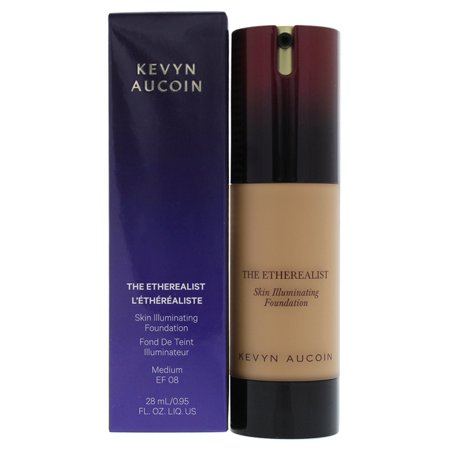 A sleek, tall bottle with a gold and black cap, containing medium-toned liquid foundation labeled "The Etherealist Skin Illuminating Foundation" by Kevyn Aucoin.