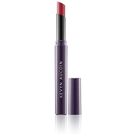 Debenhams Unforgettable Cream Lipstick in Bloodroses, featuring a sleek purple tube with a black cap, showcasing a rich, deep red lipstick bullet.