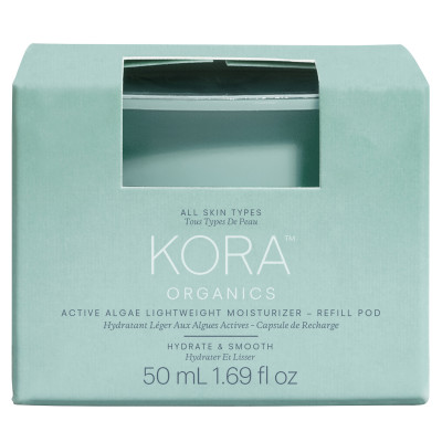 Light teal cardboard box with a minimalist design, featuring "Kora Organics" branding, product name, and refill details, containing a 50ml pod for a lightweight moisturizer.