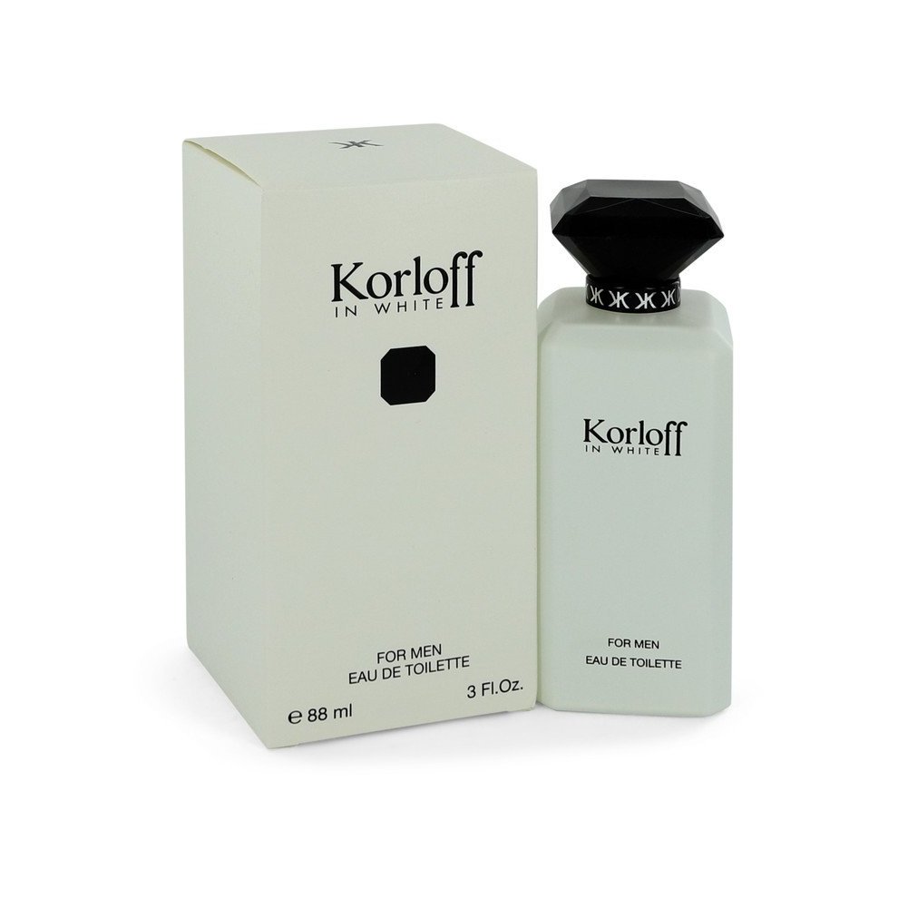 Korloff in White Intense EAU DE PARFUM SPRAY for men features a sleek white bottle with a black diamond-shaped cap, presented in a matching white box.