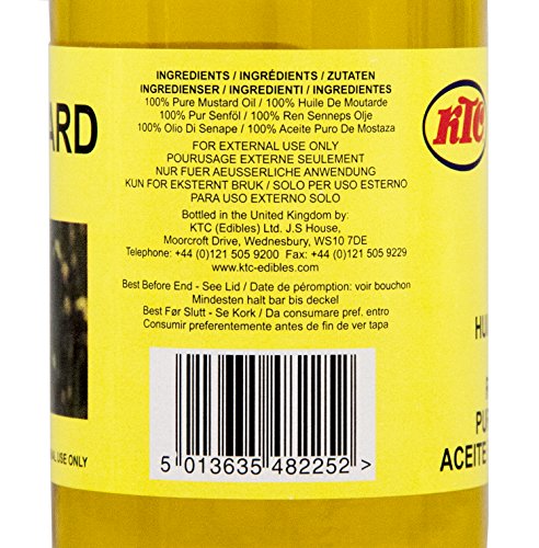 KTC 100% Pure Mustard Oil in a clear 250 ml bottle with a yellow label, featuring ingredients and usage instructions, and a red KTC logo at the top.