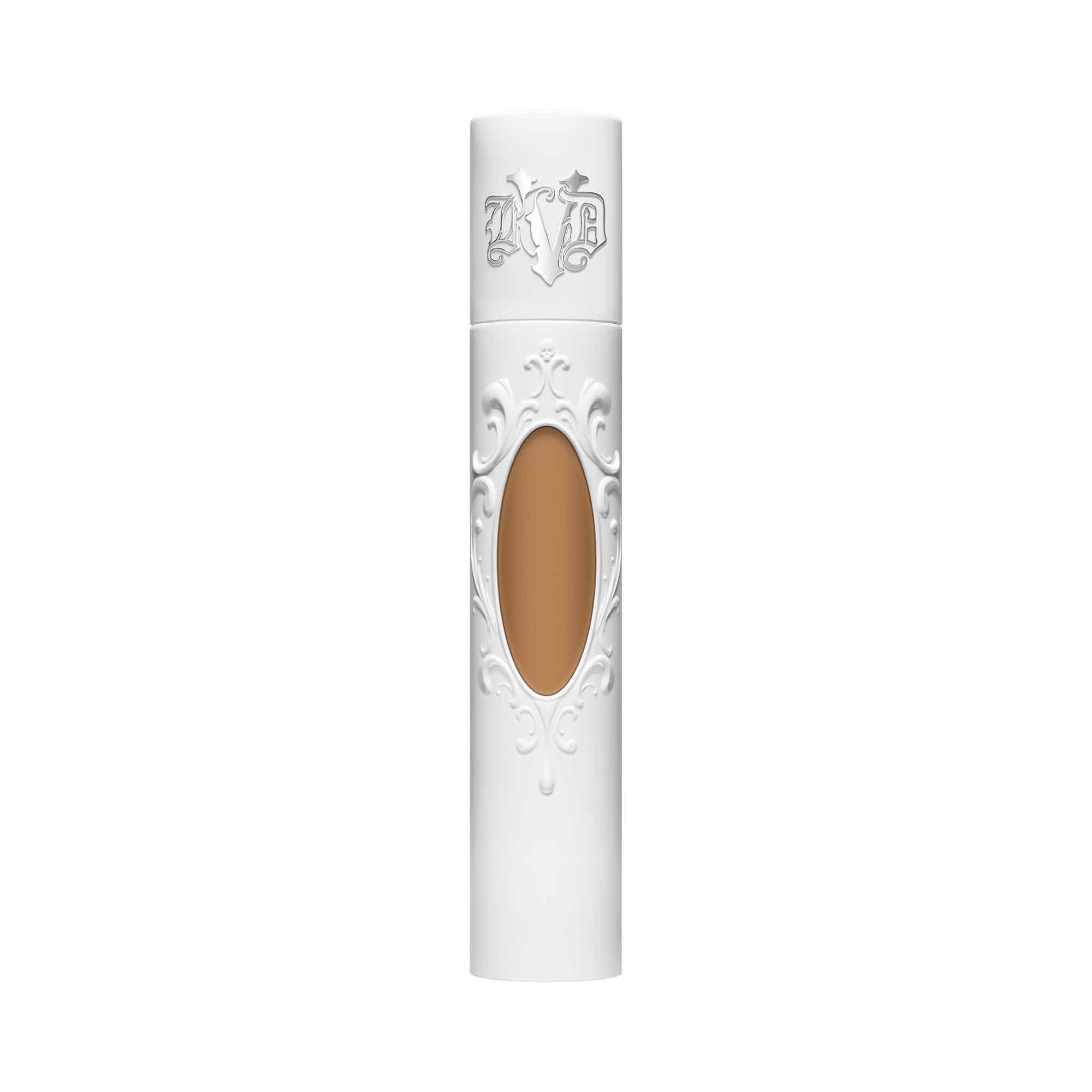 KVD True Portrait Liquid Foundation in 30ml, featuring a sleek white cylindrical bottle with ornate detailing and a clear window showcasing the tan liquid inside.