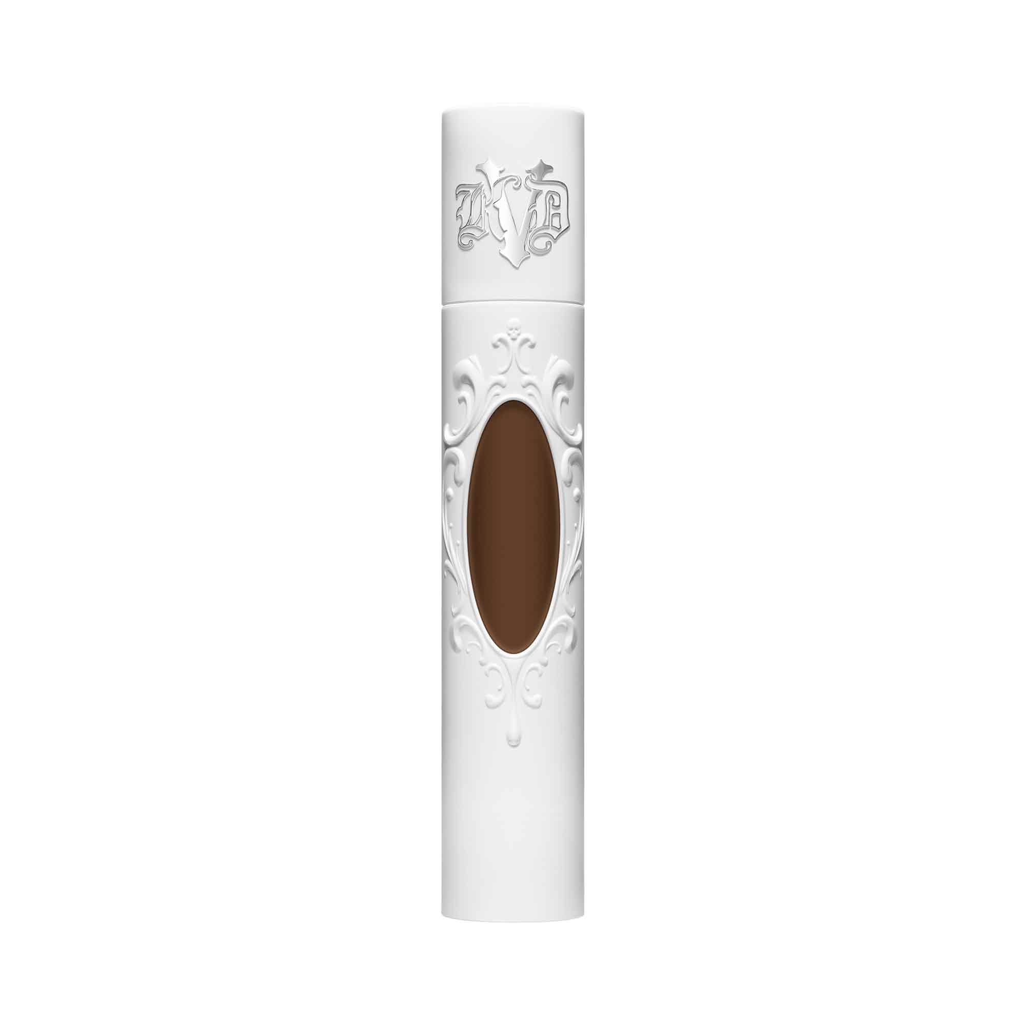 KVD True Portrait 088 Deep Liquid Foundation in a sleek white tube with ornate detailing and a clear oval window showcasing the deep brown shade inside.