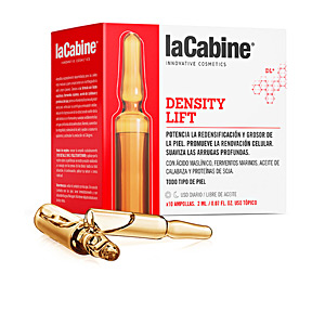 Gold ampoule with a tapered top beside a red and white box labeled "La Cabine Density Lift," featuring product details and a sleek, modern design.