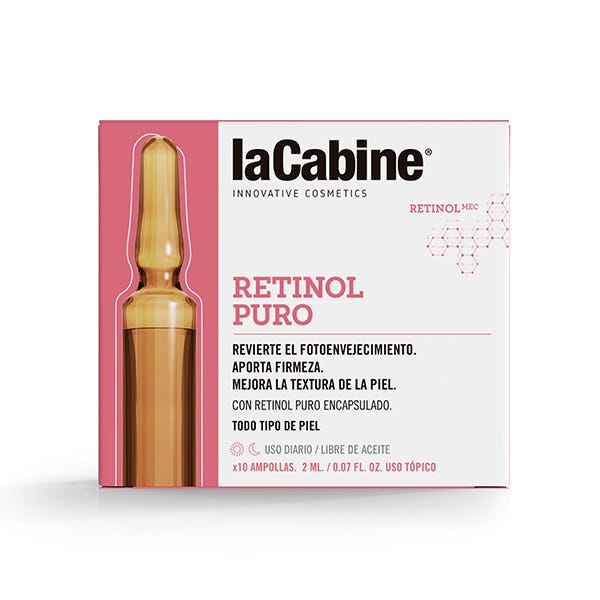 La Cabine Ampoules Retinol Pure packaging features a pink box with the brand name, product details, and a gold ampoule illustration, highlighting its innovative cosmetic benefits.