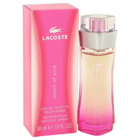 Lacoste Touch of Pink Eau De Toilette in a gradient pink bottle with a clear cap, accompanied by a matching pink box featuring the Lacoste logo.