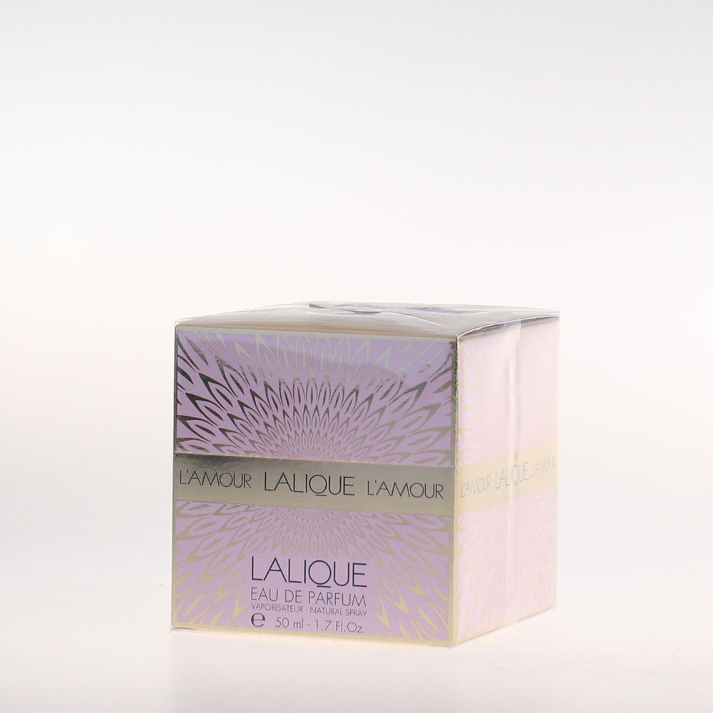 Lavender and gold box featuring a sunburst design, labeled "Lalique L'Amour Eau De Parfum for Women 30 ml" with elegant typography and a natural spray indication.