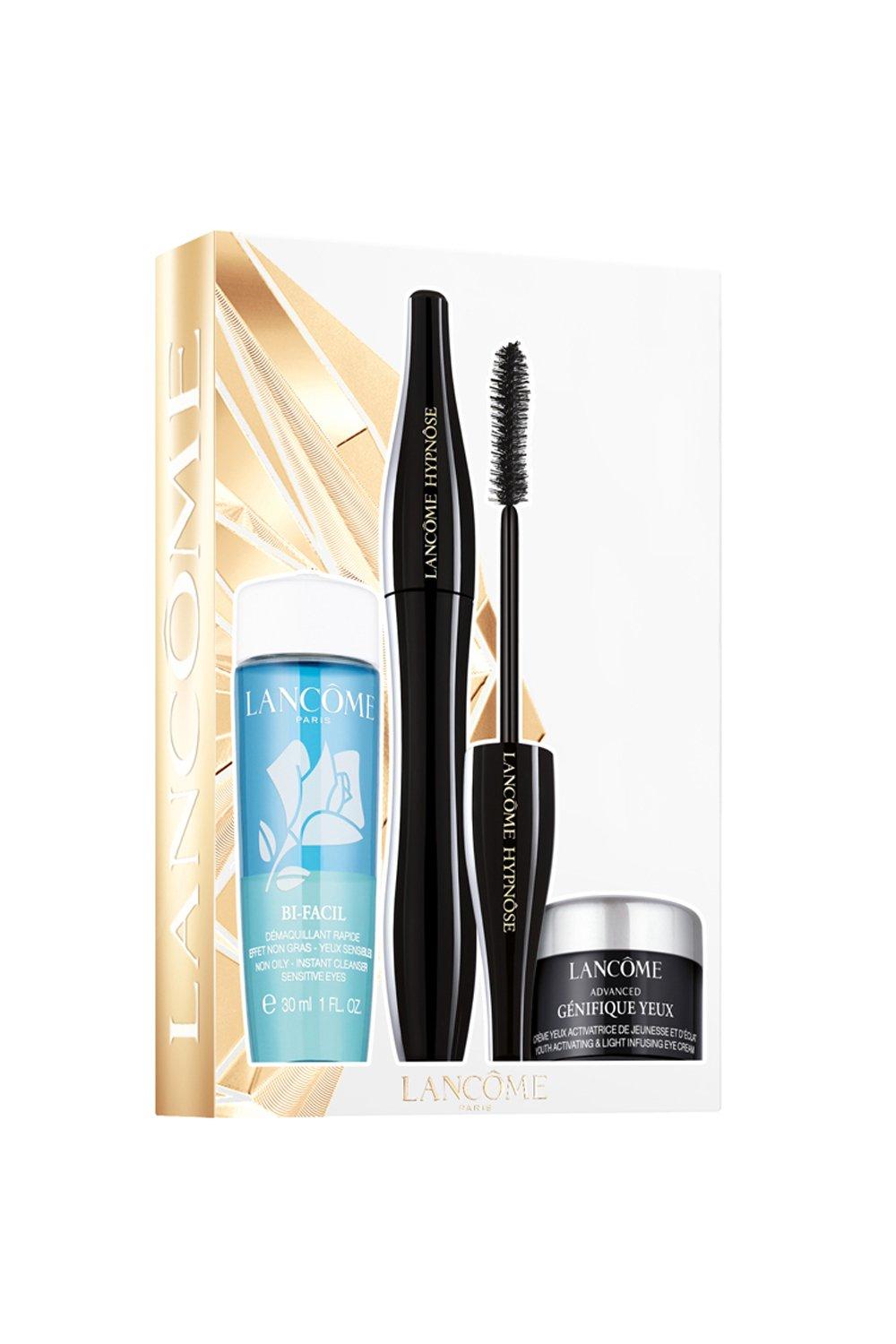 Lancôme Hypnôse Gift Set featuring a blue Bi-Facil makeup remover, black Hypnôse mascara, and Génifique Yeux eye cream, all presented in a stylish gold and white box.