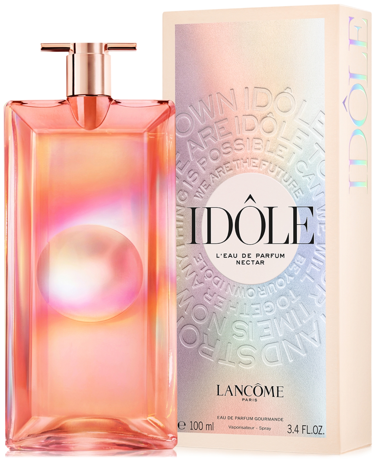 A sleek, rectangular glass bottle with a soft pink gradient, featuring a circular cutout, alongside an iridescent box with "IDÔLE" prominently displayed.