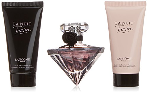 A Lancôme gift set featuring a diamond-shaped bottle of La Nuit Trésor EDP, a black body lotion tube, and a pink shower gel tube, all elegantly packaged.