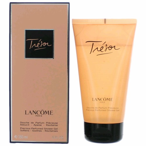 Peach-colored shower gel tube with a sleek design, featuring the Lancôme logo and "Trésor" in elegant script, packaged in a matching box.