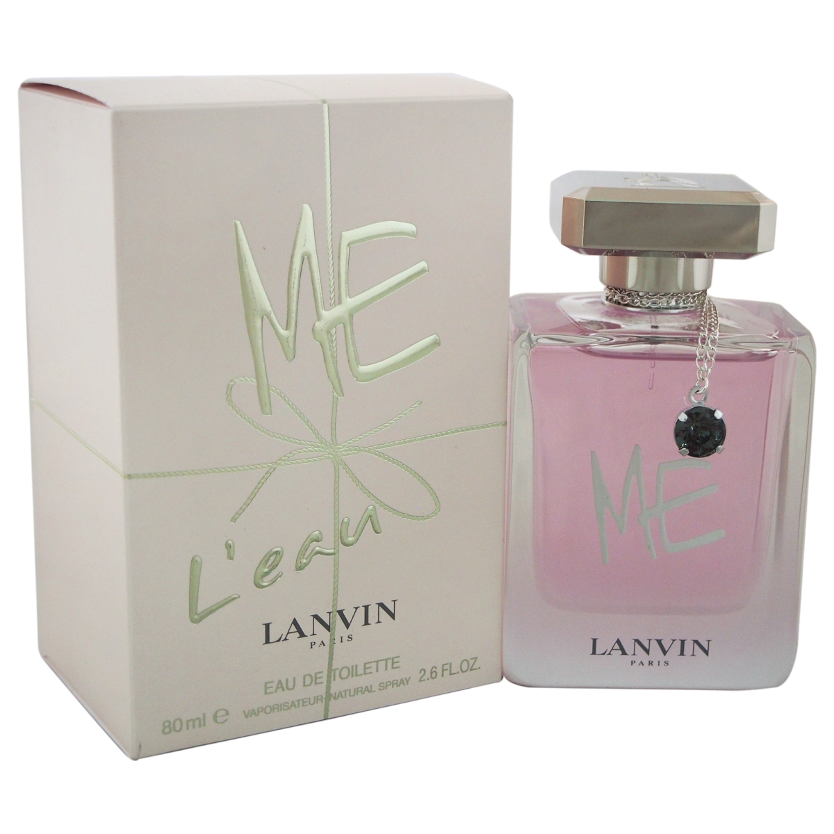 Clear glass bottle with a pink liquid, featuring a silver cap and a charm, alongside a light pink box with "ME L'eau" and "LANVIN" in elegant lettering.
