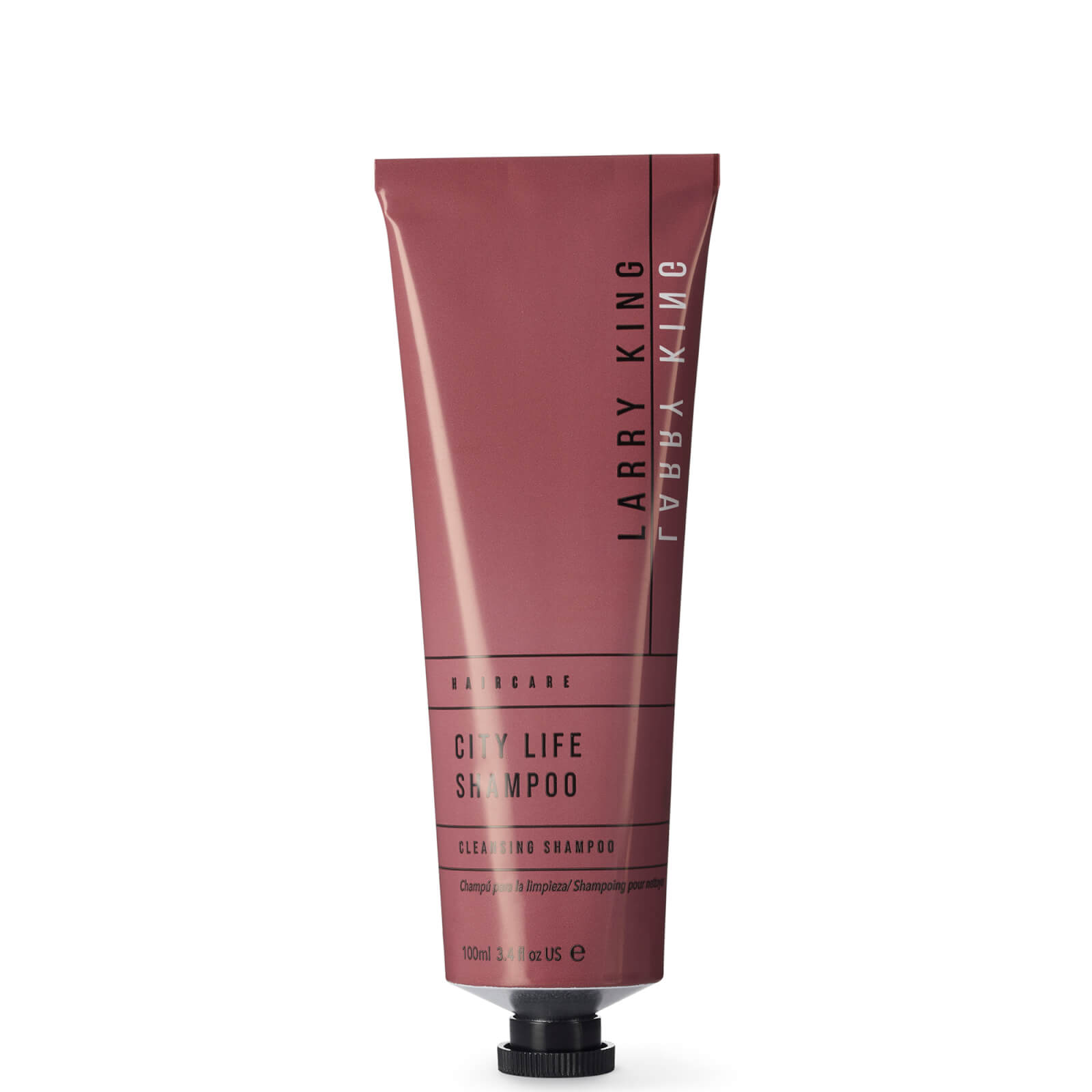 Sleek, matte burgundy tube of Larry King Haircare Good Life Shampoo, featuring minimalist black text and a flip-top cap, labeled with product details and volume of 100ml.