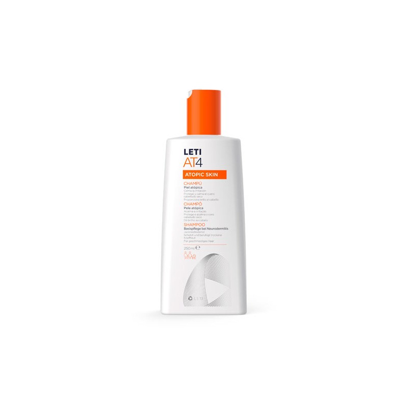 White bottle of Leti AT4 Shampoo, 250ml, featuring an orange cap, labeled for atopic skin, with clear text highlighting its key features and benefits.