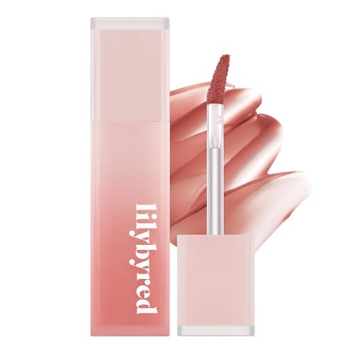 Lilybyred Sweet Liar Milky Tint features a sleek pink tube with a clear applicator, showcasing a soft, rosy lip stain with a milk foam texture for a lightweight, long-lasting finish.
